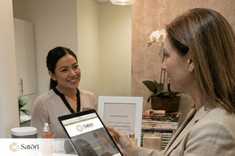 Woman discussing treatment options with stem cell dermatologist